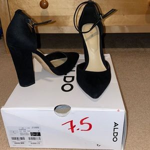 Beautiful black, closed toe, ankle strap high heels. Size 7.5 from Aldo.